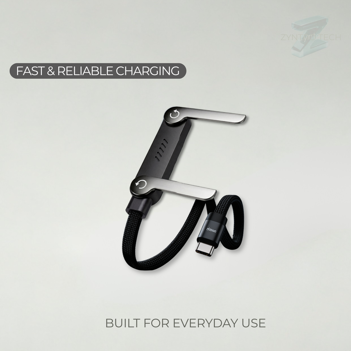 Black and silver charging cable on a light gray background with text about fast and reliable charging.