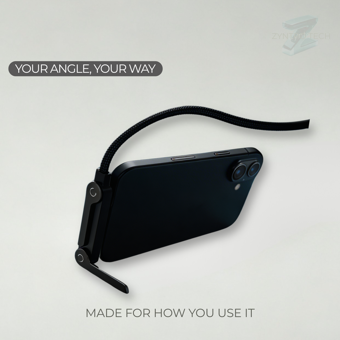 Black phone case with adjustable strap on a light gray background