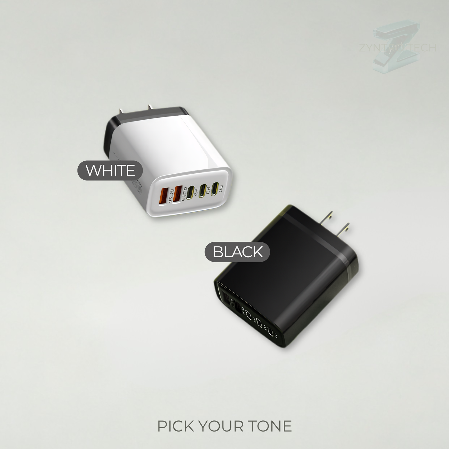 White and black USB chargers on a light gray background